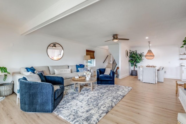 105 Causeway Ct, Gun Barrel City, TX 75156 - living area featuring stairs, light wood-style flooring, a ceiling fan, and beamed ceiling