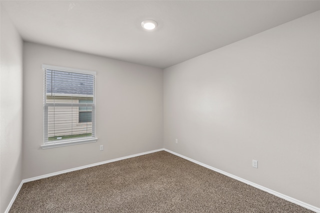 6941 Guadalupe Rd, China Spring, TX 76633 - spare room featuring carpet and baseboards