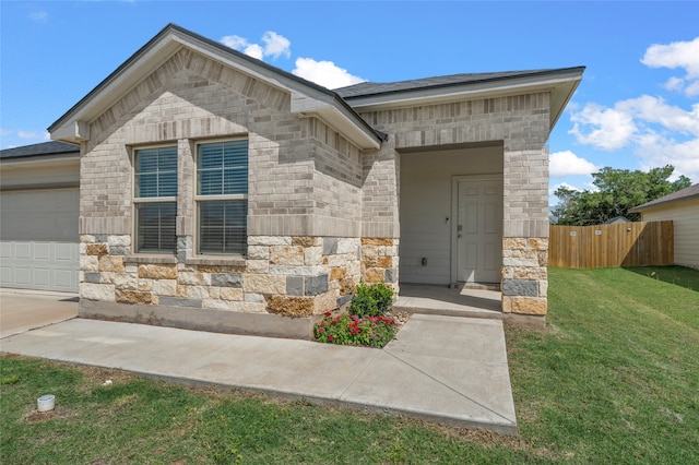 6941 Guadalupe Rd, China Spring, TX 76633 - entrance to property with stone siding and an attached garage
