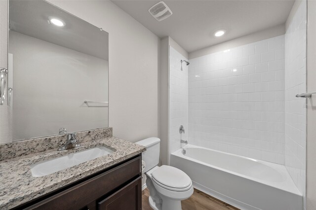 6941 Guadalupe Rd, China Spring, TX 76633 - full bathroom with wood finished floors, vanity, shower / tub combination, and recessed lighting