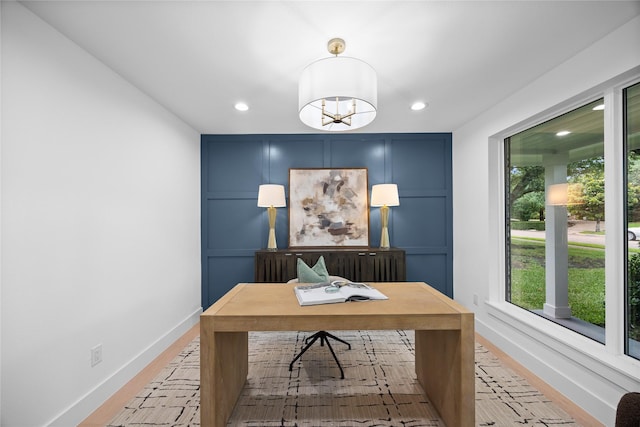 7150 Blairview Dr, Dallas, TX 75230 - office area featuring a decorative wall, recessed lighting, light wood finished floors, and a chandelier