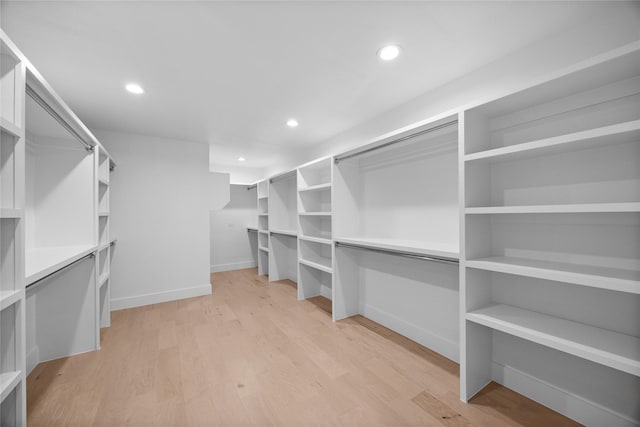 7150 Blairview Dr, Dallas, TX 75230 - spacious closet with light wood-style flooring