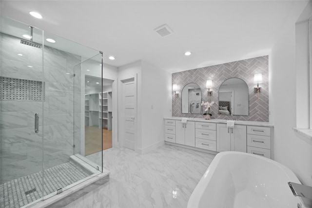 7150 Blairview Dr, Dallas, TX 75230 - full bath featuring a marble finish shower, a freestanding tub, vanity, recessed lighting, and marble finish flooring
