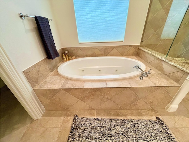 1413 Discovery Bay Dr, Frisco, TX 75036 - bathroom with a tub with jets and tile patterned flooring