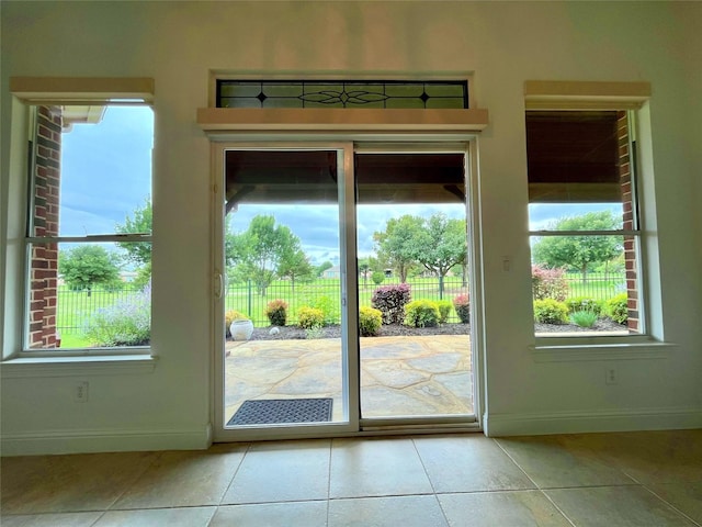 1413 Discovery Bay Dr, Frisco, TX 75036 - doorway featuring baseboards and tile patterned floors