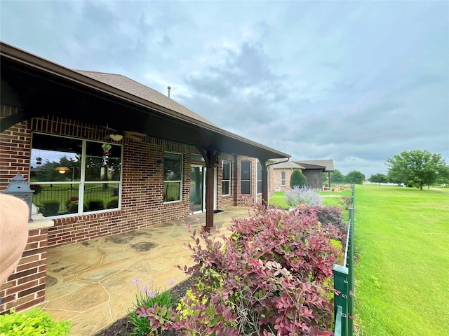 1413 Discovery Bay Dr, Frisco, TX 75036 - view of grassy yard with a patio