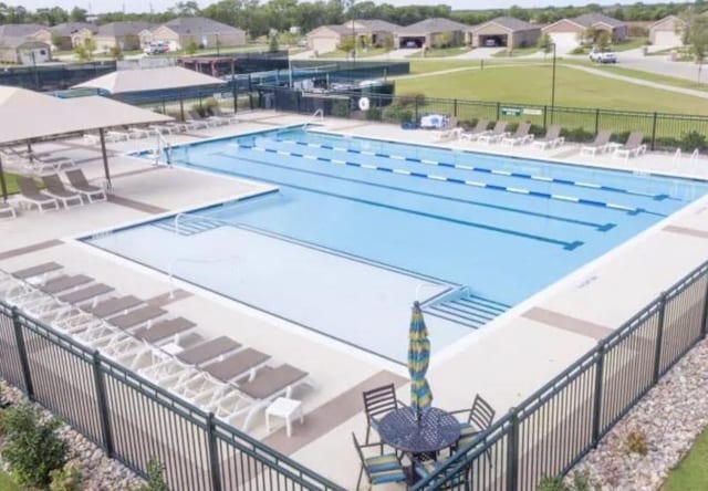 1413 Discovery Bay Dr, Frisco, TX 75036 - community pool with a patio and a residential view