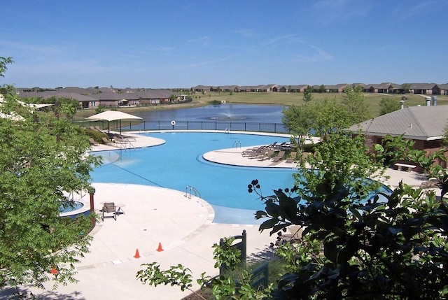 1413 Discovery Bay Dr, Frisco, TX 75036 - community pool with a residential view and a patio