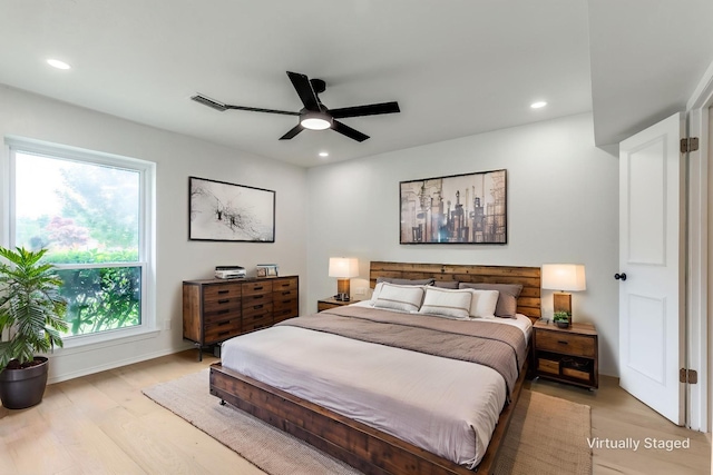 2955 Las Campanas Dr, Farmers Branch, TX 75234 - bedroom featuring light wood-style flooring, recessed lighting, and a ceiling fan