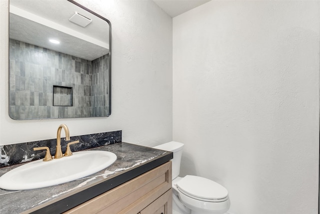 2955 Las Campanas Dr, Farmers Branch, TX 75234 - bathroom with vanity and toilet