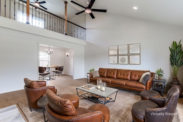 2955 Las Campanas Dr, Farmers Branch, TX 75234 - living area featuring a ceiling fan, a chandelier, high vaulted ceiling, wood finished floors, and recessed lighting