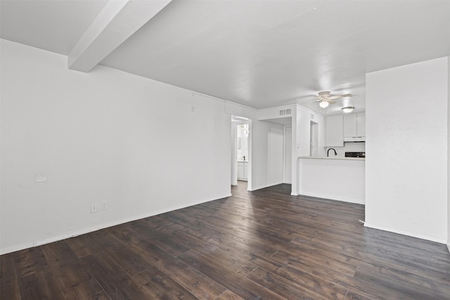5500 Boca Raton Blvd Unit 327, Fort Worth, TX 76112 - unfurnished living room featuring dark wood-style floors and ceiling fan