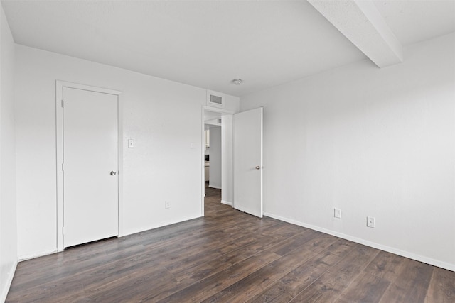 5500 Boca Raton Blvd Unit 327, Fort Worth, TX 76112 - unfurnished bedroom featuring dark wood-style floors and baseboards