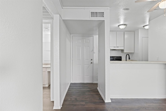 5500 Boca Raton Blvd Unit 327, Fort Worth, TX 76112 - hall with dark wood finished floors and baseboards