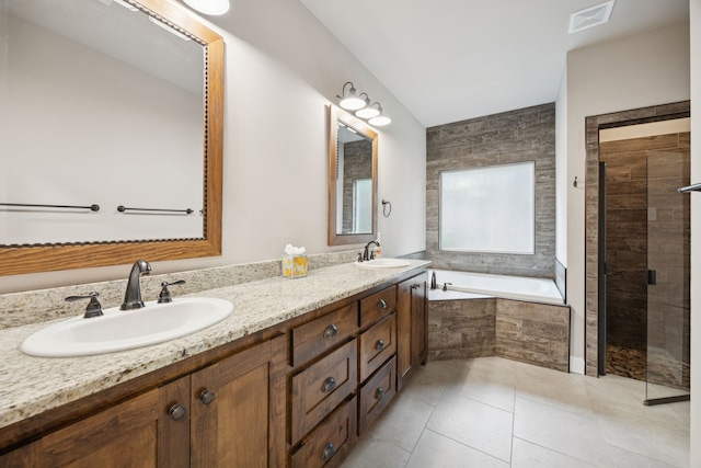 149 Ty Ln, Azle, TX 76020 - bathroom featuring a garden tub, double vanity, tiled shower, and tile patterned flooring