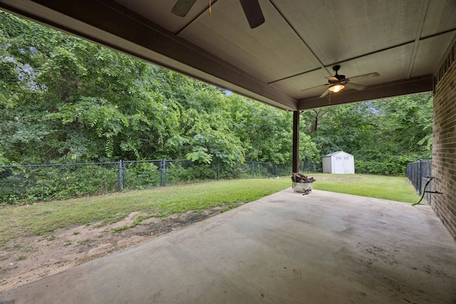 149 Ty Ln, Azle, TX 76020 - fenced backyard with ceiling fan, a patio, and a shed