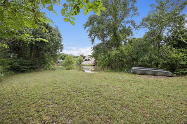 149 Ty Ln, Azle, TX 76020 - view of green lawn featuring a water view