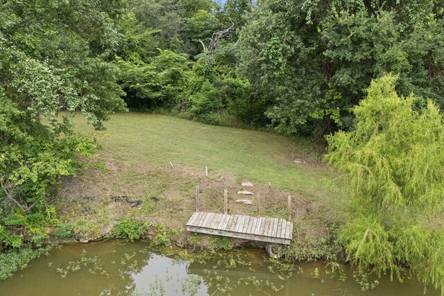 149 Ty Ln, Azle, TX 76020 - dock featuring a lawn and a water view