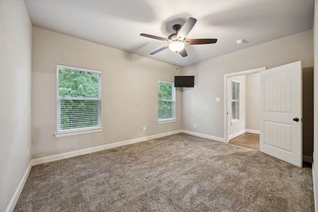149 Ty Ln, Azle, TX 76020 - empty room with carpet floors and a ceiling fan