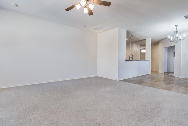 205 Bear Trl, Waxahachie, TX 75165 - unfurnished living room with ceiling fan, a chandelier, and carpet floors