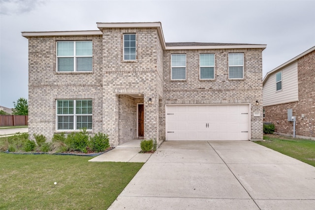 721 Brockwell Bnd, Forney, TX 75126 - traditional-style home featuring an attached garage, driveway, a front yard, and brick siding