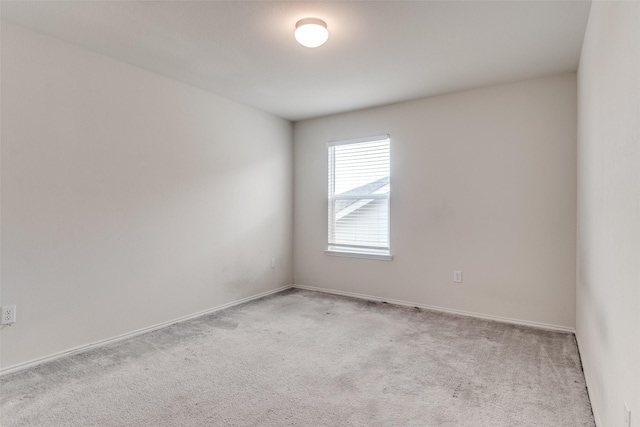 721 Brockwell Bnd, Forney, TX 75126 - carpeted spare room with baseboards