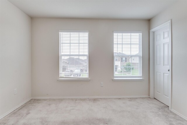 721 Brockwell Bnd, Forney, TX 75126 - carpeted empty room with baseboards