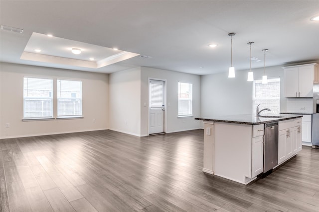 721 Brockwell Bnd, Forney, TX 75126 - kitchen with appliances with stainless steel finishes, open floor plan, recessed lighting, dark wood-style flooring, and an island with sink