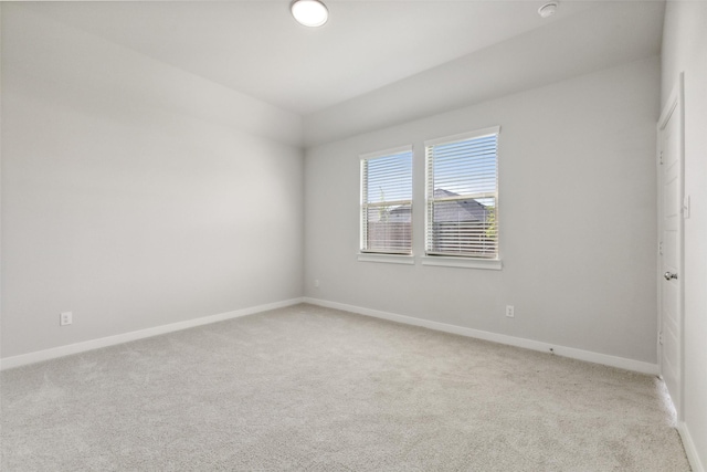 923 Hazel Dr, Lavon, TX 75166 - spare room featuring light carpet and lofted ceiling