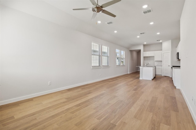 923 Hazel Dr, Lavon, TX 75166 - unfurnished living room featuring a ceiling fan, recessed lighting, and light wood finished floors
