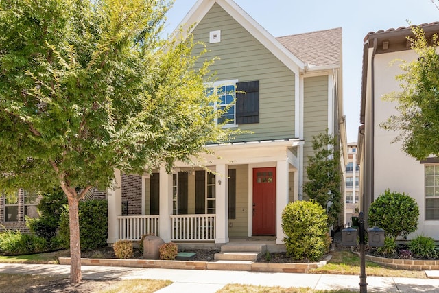 354 Loma Alta Dr, Flower Mound, TX 75022 - view of front facade featuring a porch and a shingled roof