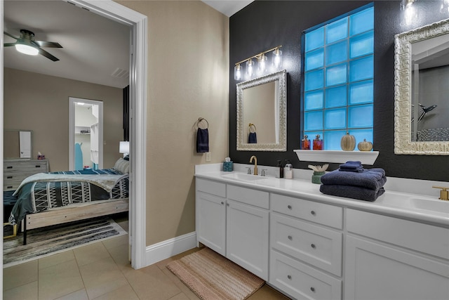 354 Loma Alta Dr, Flower Mound, TX 75022 - ensuite bathroom featuring double vanity, a ceiling fan, and tile patterned floors