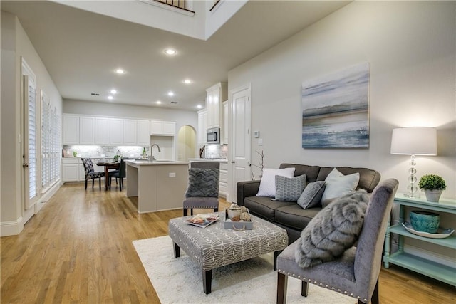 354 Loma Alta Dr, Flower Mound, TX 75022 - living room featuring light wood-style flooring and recessed lighting
