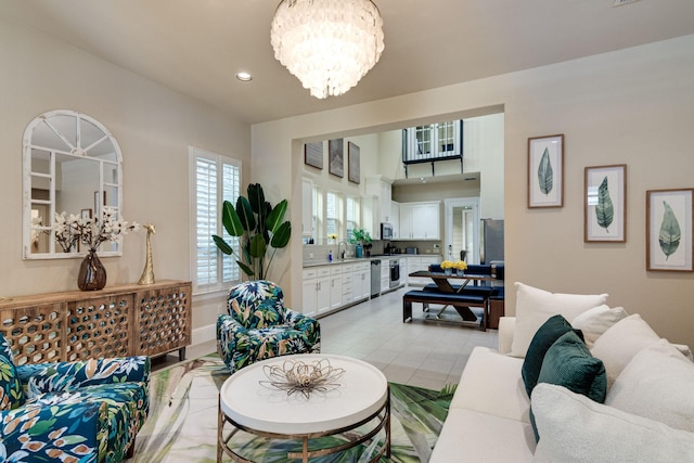 354 Loma Alta Dr, Flower Mound, TX 75022 - living area with a chandelier, recessed lighting, and beverage cooler