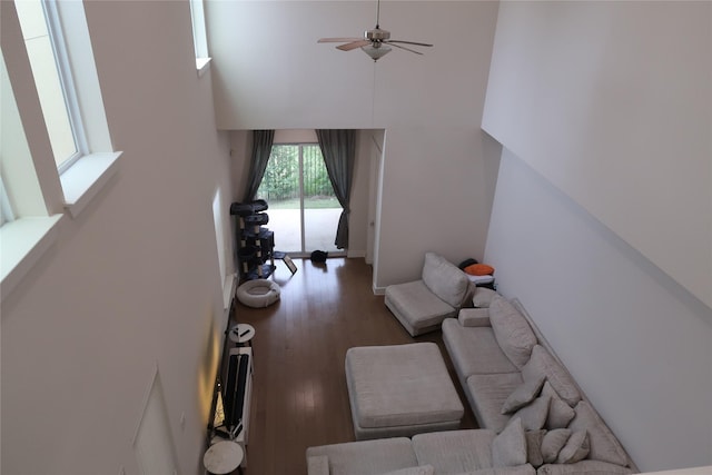 8327 Nunley Ln, Dallas, TX 75231 - living room featuring a high ceiling, wood finished floors, and a ceiling fan