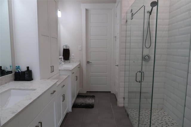 8327 Nunley Ln, Dallas, TX 75231 - full bath with vanity, a shower stall, and tile patterned floors