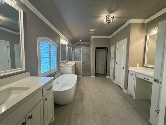 3324 Acorn Hill Trl, Weatherford, TX 76087 - full bathroom featuring a shower stall, two vanities, a freestanding bath, and ornamental molding