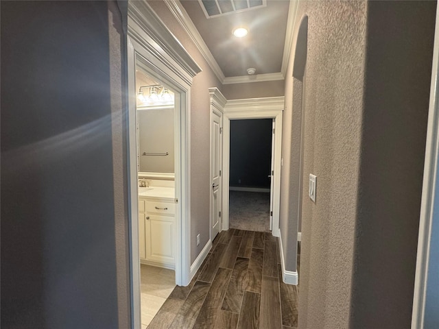 3324 Acorn Hill Trl, Weatherford, TX 76087 - corridor with wood tiled floors and crown molding
