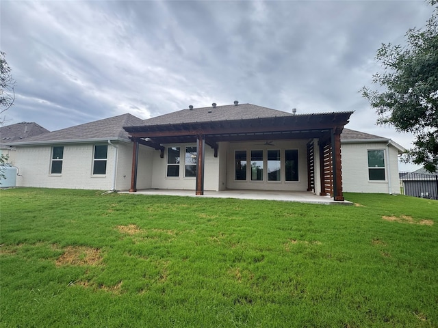 3324 Acorn Hill Trl, Weatherford, TX 76087 - back of property with a patio, a ceiling fan, and a lawn
