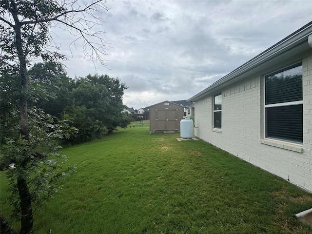 3324 Acorn Hill Trl, Weatherford, TX 76087 - view of grassy yard featuring a storage unit