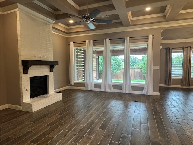 3324 Acorn Hill Trl, Weatherford, TX 76087 - unfurnished living room with dark wood-type flooring, ceiling fan, crown molding, a fireplace, and coffered ceiling