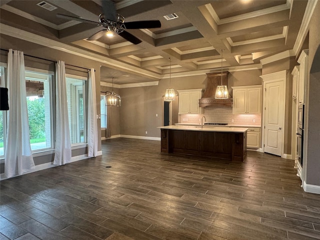 3324 Acorn Hill Trl, Weatherford, TX 76087 - kitchen featuring custom exhaust hood, light countertops, tasteful backsplash, dark wood-type flooring, and a chandelier