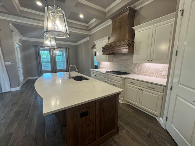 3324 Acorn Hill Trl, Weatherford, TX 76087 - kitchen with custom exhaust hood, ornamental molding, dark wood finished floors, light countertops, and decorative backsplash
