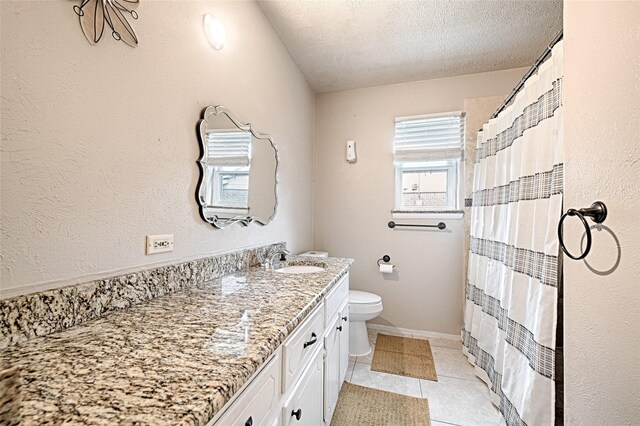 1803 Windsor Dr, Arlington, TX 76012 - bathroom featuring vanity, a textured ceiling, tile patterned flooring, and a shower with curtain