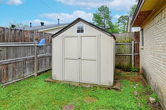 1803 Windsor Dr, Arlington, TX 76012 - view of shed with a fenced backyard