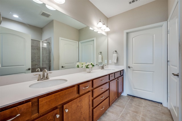 8031 Reservoir Dr, Frisco, TX 75036 - bathroom with double vanity, a stall shower, and tile patterned flooring
