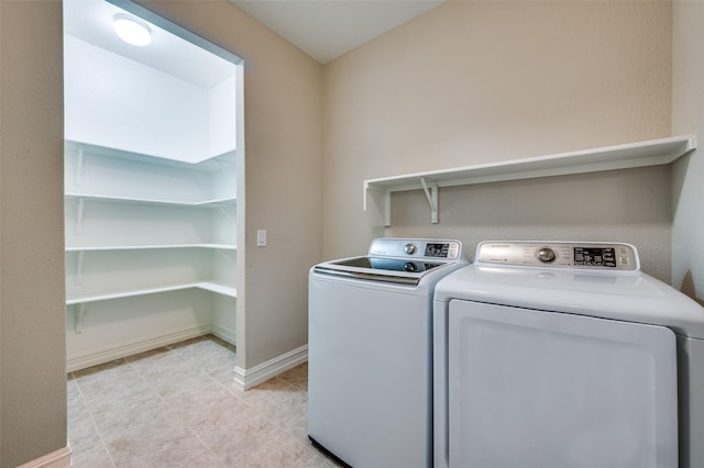 8031 Reservoir Dr, Frisco, TX 75036 - laundry area with independent washer and dryer and light tile patterned floors