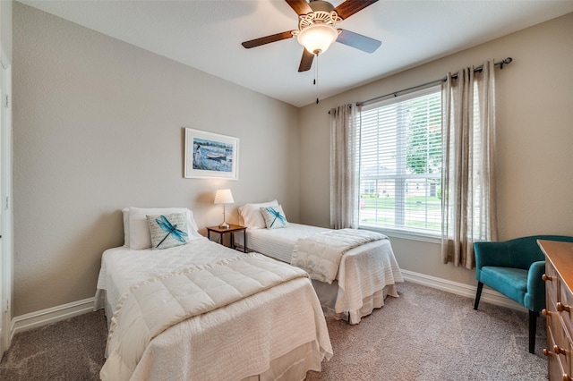 8031 Reservoir Dr, Frisco, TX 75036 - bedroom featuring light carpet and a ceiling fan