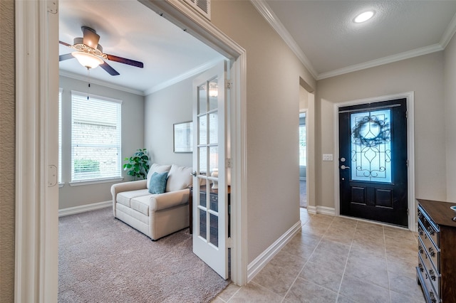 8031 Reservoir Dr, Frisco, TX 75036 - entrance foyer with crown molding and a ceiling fan