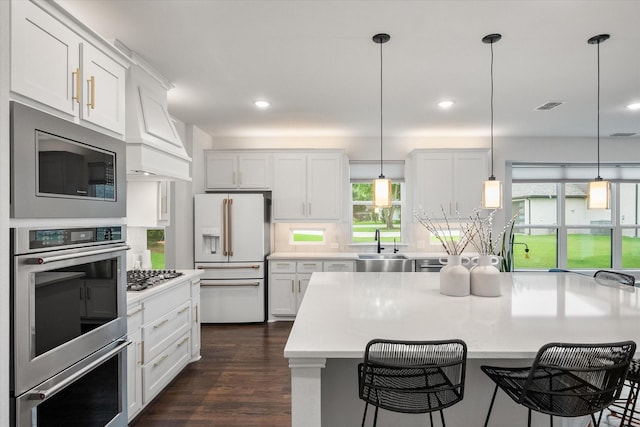 3603 High Dr, Grapevine, TX 76051 - kitchen featuring stainless steel appliances, light countertops, white cabinetry, and recessed lighting